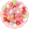 A wooden toy birthday cake with various fruit and dessert toppings. Anteprima dell’immagine prodotto