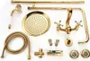 A collection of gold-colored shower fixtures and accessories laid out on a white background. Produktbild-Vorschau