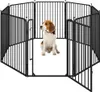 A beagle dog sits inside a black metal dog playpen. Podgląd zdjęcia produktu