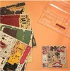 A collection of wooden puzzle pieces and a clear plastic frame are arranged on an orange background. Podgląd zdjęcia produktu