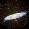 A projection of a spiral galaxy against a dark, star-filled background. Anteprima dell’immagine prodotto