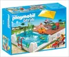 A Playmobil City Life Einbau-Swimmingpool playset box, showing the product in use with figures and accessories. Voir les images du produit