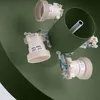 Close-up view of the internal components of a ceiling light fixture, showing the bulb sockets and wiring. Produktbild-Vorschau