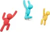 Three colorful, stylized human figures are shown against a white background. They are depicted in dynamic poses, appearing to climb or hang. Anteprima dell’immagine prodotto
