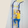 A young girl is climbing a home gym ladder with various accessories attached. Voir les images du produit