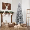 A decorated Christmas tree with gifts and stockings displayed near a fireplace. Náhľad obrázku produktu