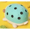 A toy hedgehog with holes on its back and feet is shown against a yellow background. Náhľad obrázku produktu