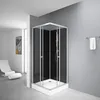 A modern bathroom with a black glass shower cabin. Produktbild-Vorschau