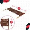 A woven willow fence segment with pointed stakes for insertion into the ground, shown with dimensions indicated. Voir les images du produit