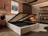 A bedroom scene with an open storage bed, a chair, and shelving. Produktbild-Vorschau