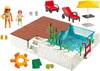 A Playmobil swimming pool set with figures, furniture, and accessories. Voir les images du produit