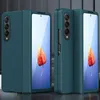 Two teal phone cases for a foldable phone are displayed side-by-side against a light gray background. Voir les images du produit