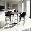 A modern kitchen and dining area with a bar table and stools. Náhled obrázku produktu
