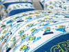A close-up view of a children's bedding set featuring a Minions-themed print. Produktbild-Vorschau