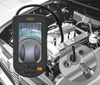 A digital inspection camera is shown in front of a car engine, with a close-up inset showing the camera probe near a spark plug. Náhled obrázku produktu