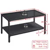 A black poly-rattan coffee table with a glass top and a lower shelf, shown with dimensions and weight capacity indicated by text overlays. Produktbild-Vorschau