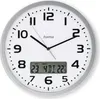 A white analog clock with a digital display showing the date and temperature, set against a white background. Voir les images du produit