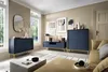 A modern living room with dark blue furniture, a mustard-colored sofa, and large windows. Podgląd zdjęcia produktu