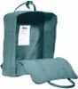 An open teal backpack with a white label inside. Náhled obrázku produktu