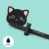 A black cat-themed erasable gel pen with a cap featuring a cat face, resting on a light blue background. A small circle with a black ink drop and the word 'BLACK' is in the lower left corner. Náhľad obrázku produktu