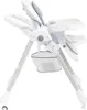 A white baby high chair with gray accents is shown from the side against a white background. Produktbild-Vorschau