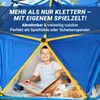 A young boy is sitting inside a blue and yellow play tent, reading a book. Produktbild-Vorschau