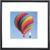 A framed picture of a hot air balloon. Produktbild-Vorschau