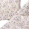 A close-up view of a floral patterned bedding set, showing a pillow and a duvet cover. Produktbild-Vorschau
