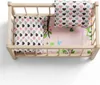 Ein Puppenbett aus Holz in einer natürlichen Farbe mit Produktbild-Vorschau 5