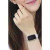 A woman's wrist wearing a smartwatch. Produktbild-Vorschau