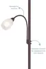 A close-up view of a floor lamp with a flexible reading arm and a frosted glass shade. Produktbild-Vorschau