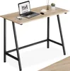 A desk with a laptop, mouse, and a small plant on it, set against a white background. Náhled obrázku produktu