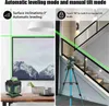 A split image showing a laser level in two different settings: one on a table in front of a framed picture, and another on a tripod on a staircase. Podgląd zdjęcia produktu