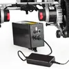 A close-up view of a power wheelchair battery pack and charger. Náhľad obrázku produktu