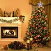 A decorated Christmas tree and fireplace scene. Produktbild-Vorschau