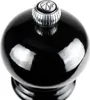 A close-up shot of the top of a black pepper mill. Produktbild-Vorschau