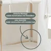 Close-up view of the corner of a white tent with wooden poles, highlighting assembly features. Náhled obrázku produktu