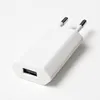 A white USB power adapter with two prongs for plugging into a wall socket. Produktbild-Vorschau