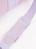 A close-up shot of a purple shoulder strap with a textured pad. Produktbild-Vorschau