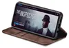 A smartphone in a brown flip case is displayed on a white background, showing a movie streaming interface on its screen. Produktbild-Vorschau