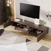 A modern living room with a TV stand and a large TV mounted on the wall. Produktbild-Vorschau