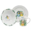 A set of children's ceramic tableware featuring Bluey characters and leaf motifs, presented on a white background. Voir les images du produit