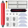 A collection of cleaning accessories for a robot vacuum cleaner, laid out on a white background. Produktbild-Vorschau