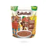 A pouch of baby cereal with a cartoon bear and houses on it. Produktbild-Vorschau