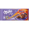 A Milka & Daim chocolate bar packaging with product images. Produktbild-Vorschau