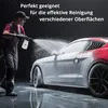 A person is using a foam sprayer to clean a car. Podgląd zdjęcia produktu