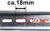 A close-up view of a metal rail with perforated slots, showing measurement indicators. Produktbild-Vorschau