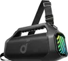 A black portable speaker with a handle and a strap, against a white background. Voir les images du produit