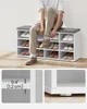 A man is sitting on a shoe rack bench and tying his shoes. There are also close-up shots of the shoe rack's dimensions and feet. Produktbild-Vorschau