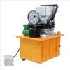 A hydraulic pump unit with a pressure gauge and foot pedal, presented against a white background. Podgląd zdjęcia produktu